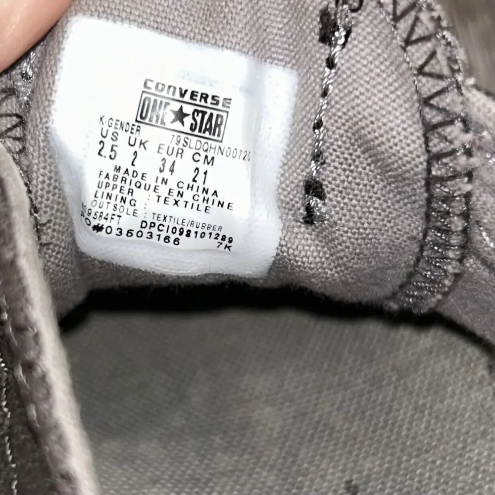 Converse previously owned